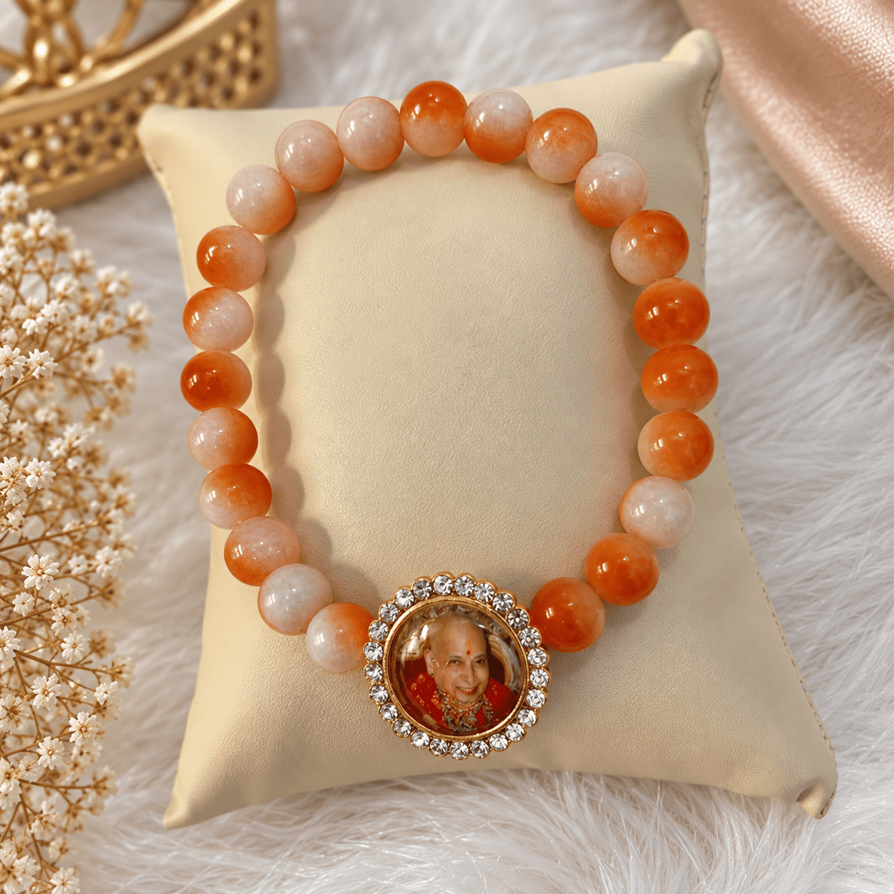 Guruji Blessings Bracelet with orange and peach beads and Guruji photo charm