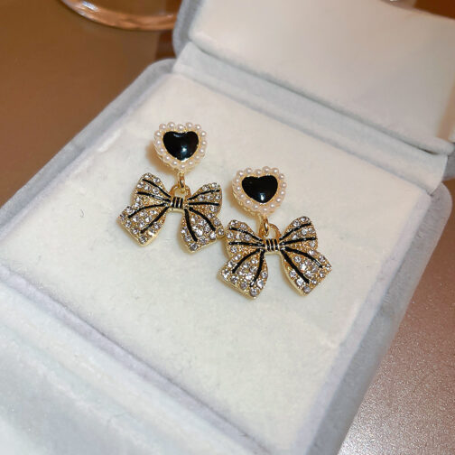 Black Heart & Bow Drop Earrings - Image 3