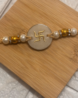 Swastik Aura Pearl Rakhi
