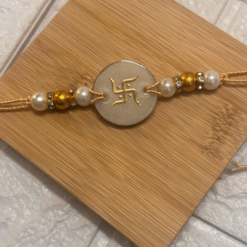 Swastik Aura Pearl Rakhi