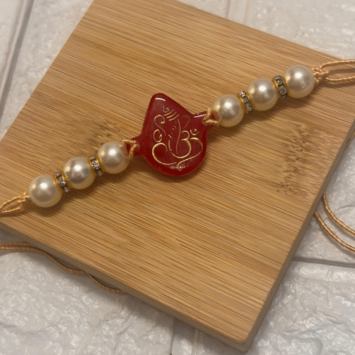 Ganesh Pearl Resin Rakhi