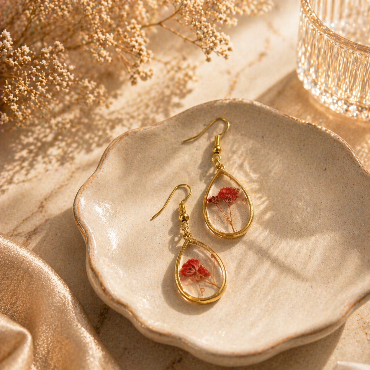 blossom drop resin earrings gold teardrop